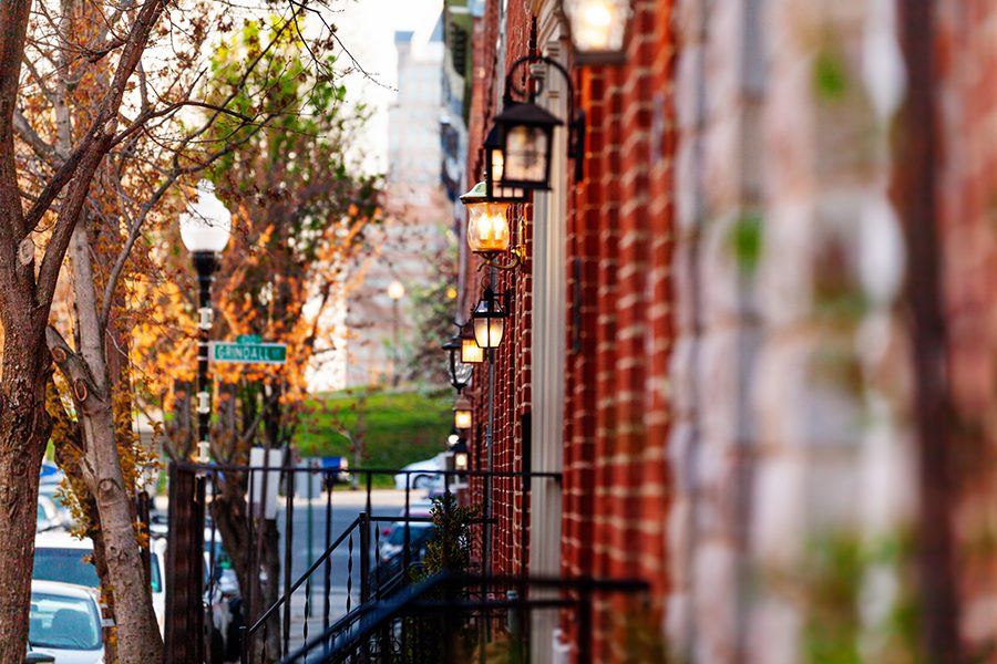Silver Spring, MD - Closeup and Angled View of Red Brick City Houses with Lamp Lighting